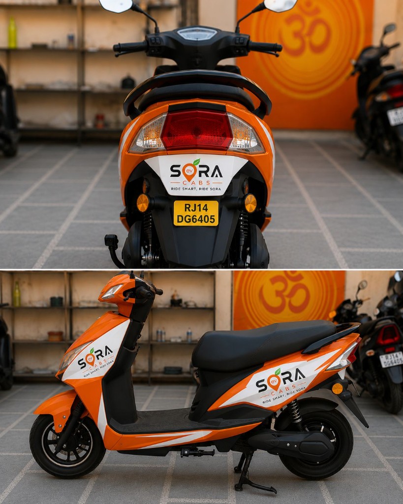 Sora Cabs orange electric scooter side view